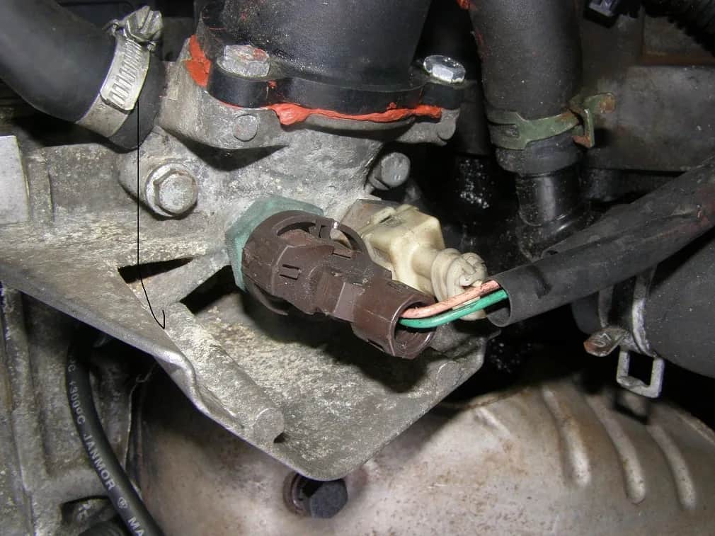 Gdzie jest czujnik temperatury w Renault Scenic 1.9 DCI? Uniknij kosztownej awarii!